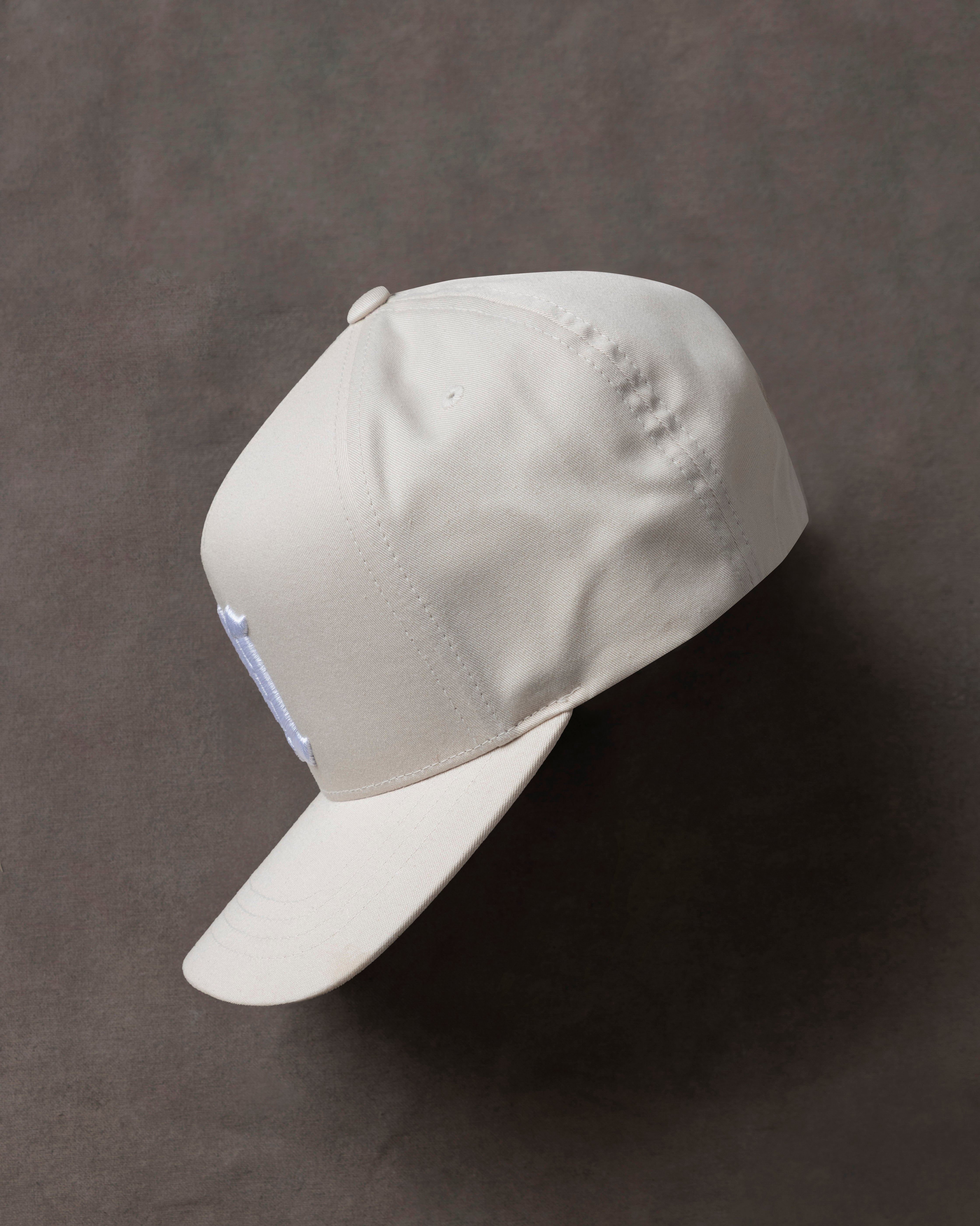 Line U High Crown Cap Cream