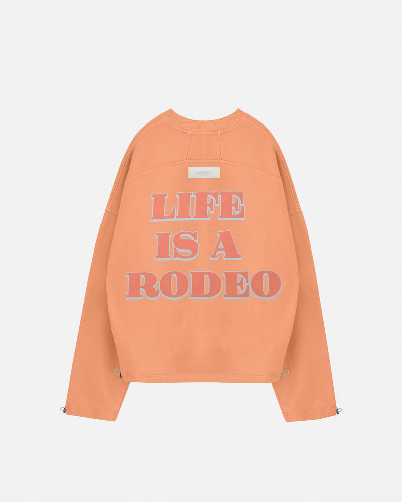 Rodeo "Life is a Rodeo" Crewneck Orange