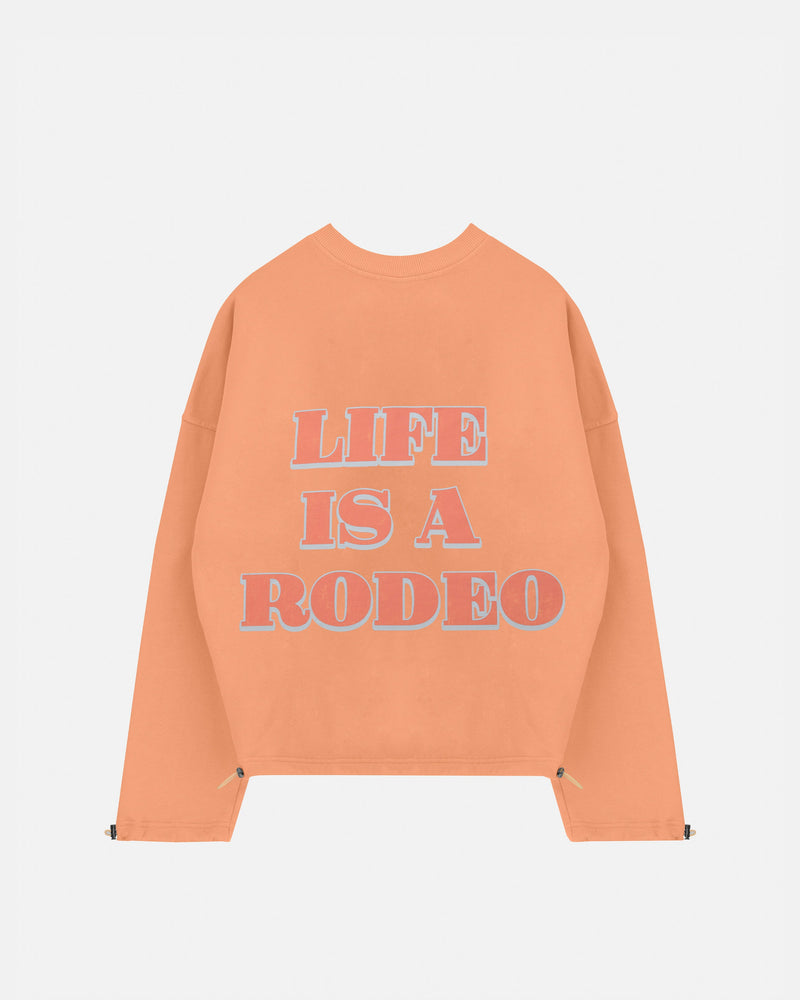 Rodeo "Life is a Rodeo" Crewneck Orange